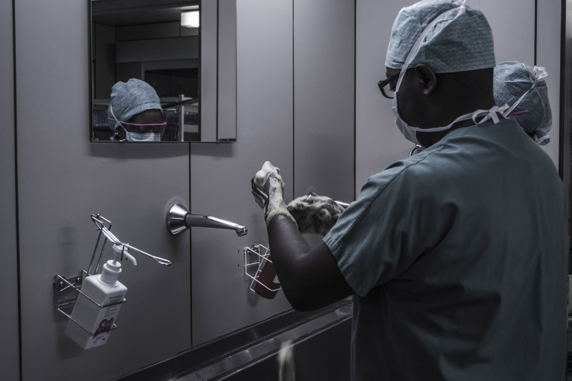 Surgeon scrubbing up.jpg