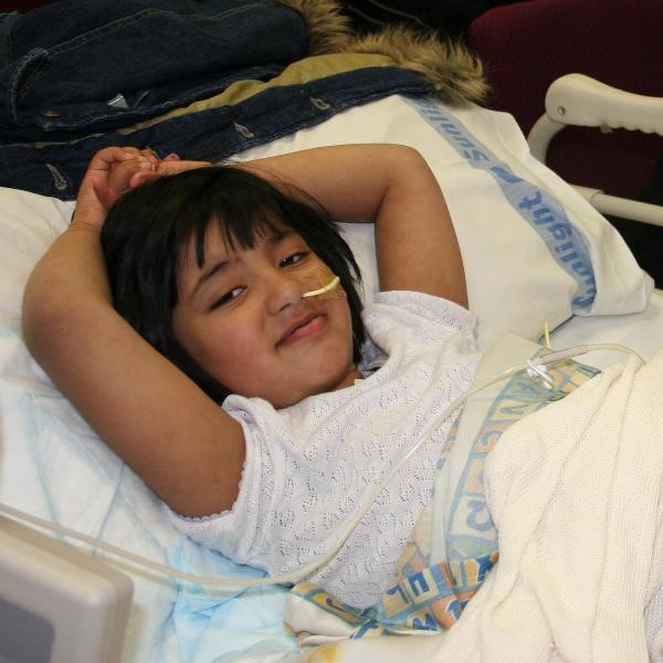 young girl with nasogastric tube